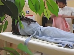Japanese hottie toyed in oily massage voyeur video